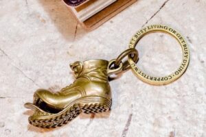 The brass keychain seen in the physical store, all exquisite, men like