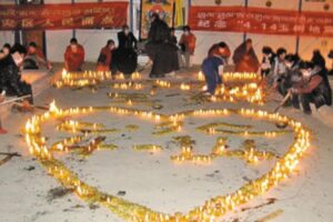 One hundred thousand butter lamps light hope